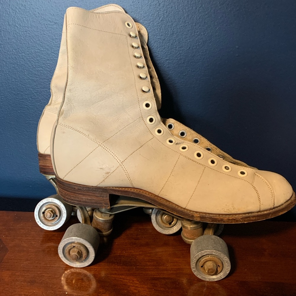 Antique Leather Roller Skates with Metal Wheels